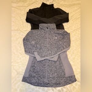 The North Face Women's chacooal and gray zip up fleece jackets